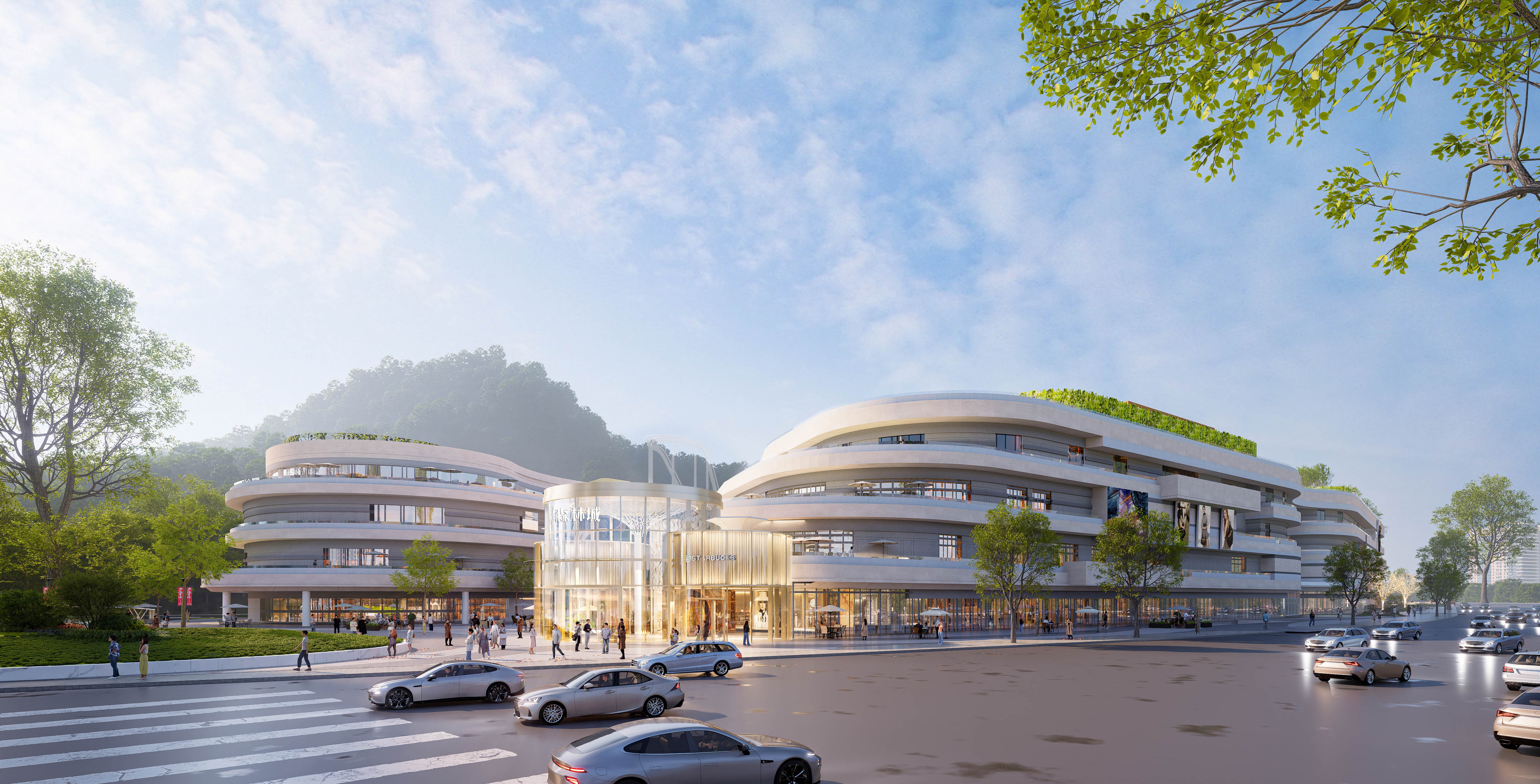 现代购物中心内，人们在明亮的走廊中行走，天花板装饰有圆环形灯光，商店包括Calvin Jeans和DISSONA。