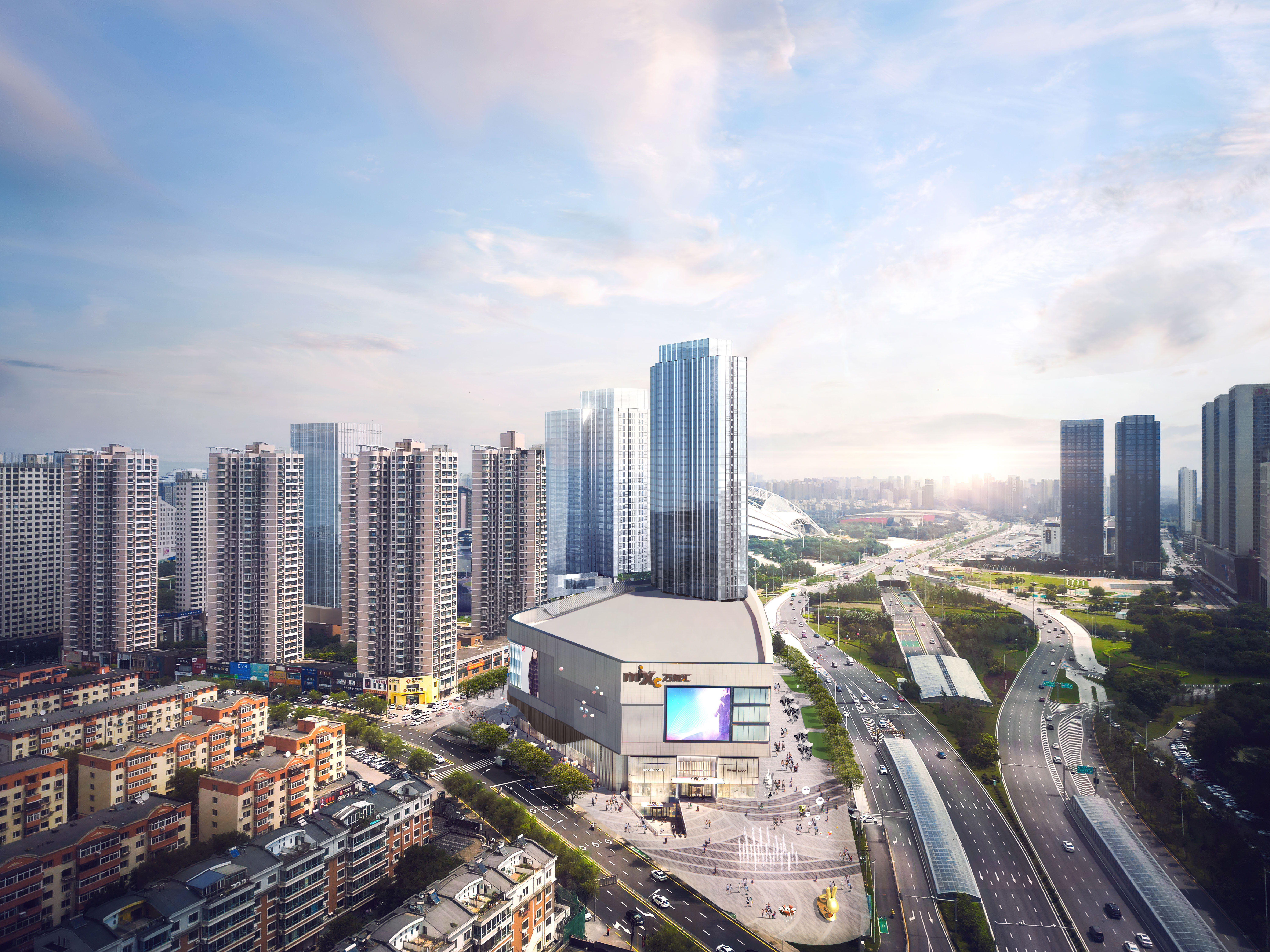 购物中心内现代圆形天花板，中央区域有三角形镜面装饰，周围环绕暖色灯光。